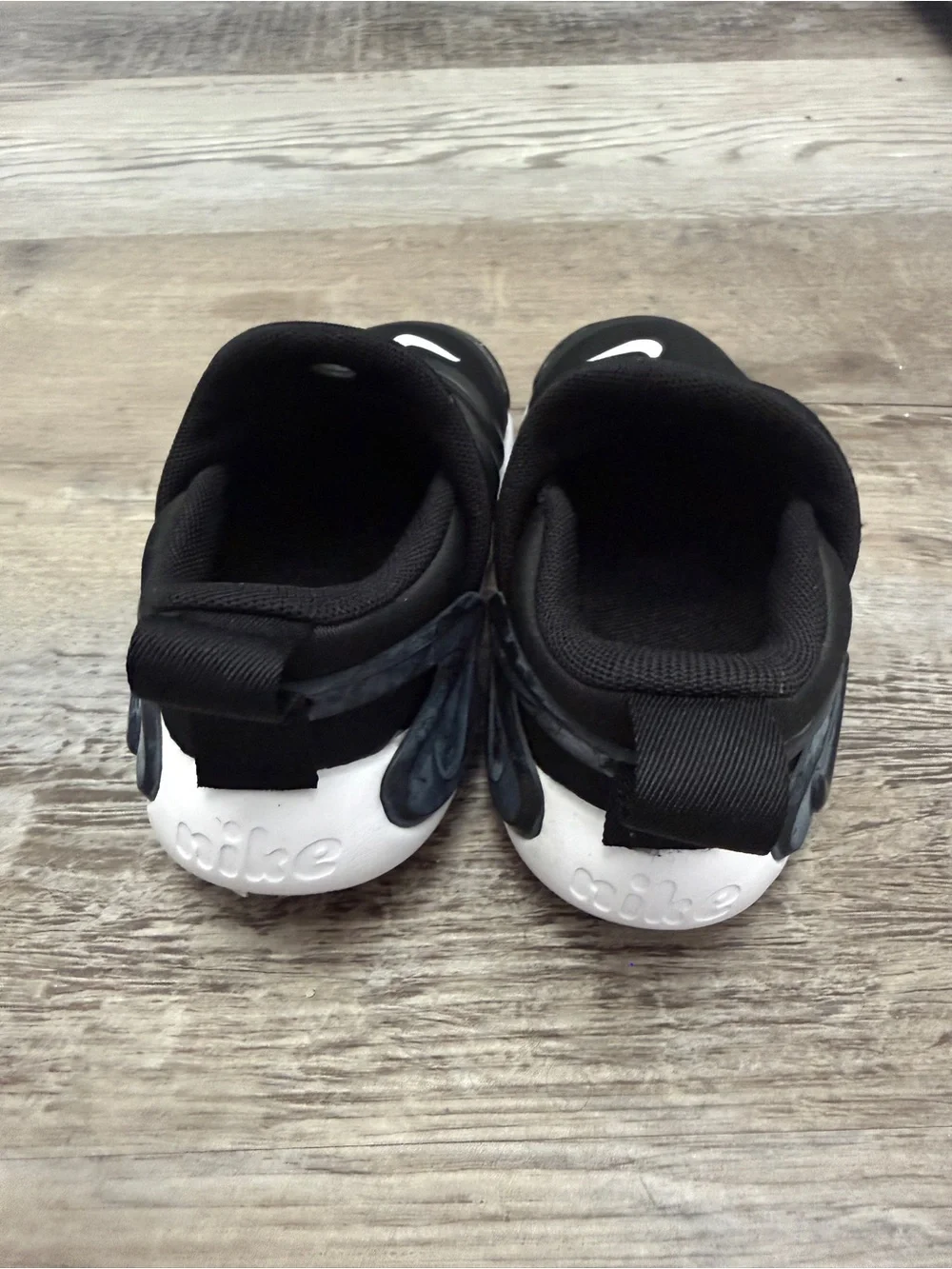 Nike Dynamo Go Kids Black Slip-On Sneakers with White Swoosh
